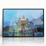 Large abstract wall art depicting a serene Laos landscape in muted green and blue tones, framed in black acrylic.