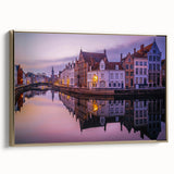 Framed canvas featuring a vintage-style landscape painting of a Belgian scenery in muted earth tones.