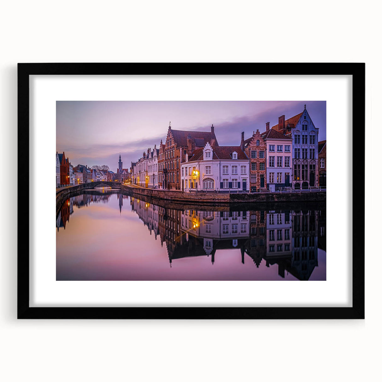 Extra large abstract art print of a colorful European scenery on textured canvas, framed in black.