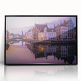 Large abstract wall art depicting a European cityscape in muted gray and blue tones on a framed acrylic.