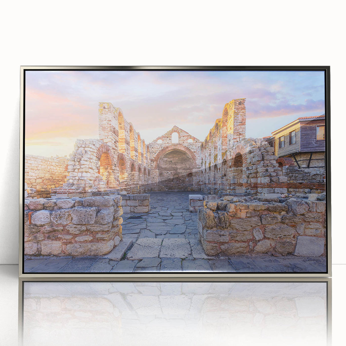Large acrylic print of a European Bulgarian scenery in muted earth tones, framed in silver.