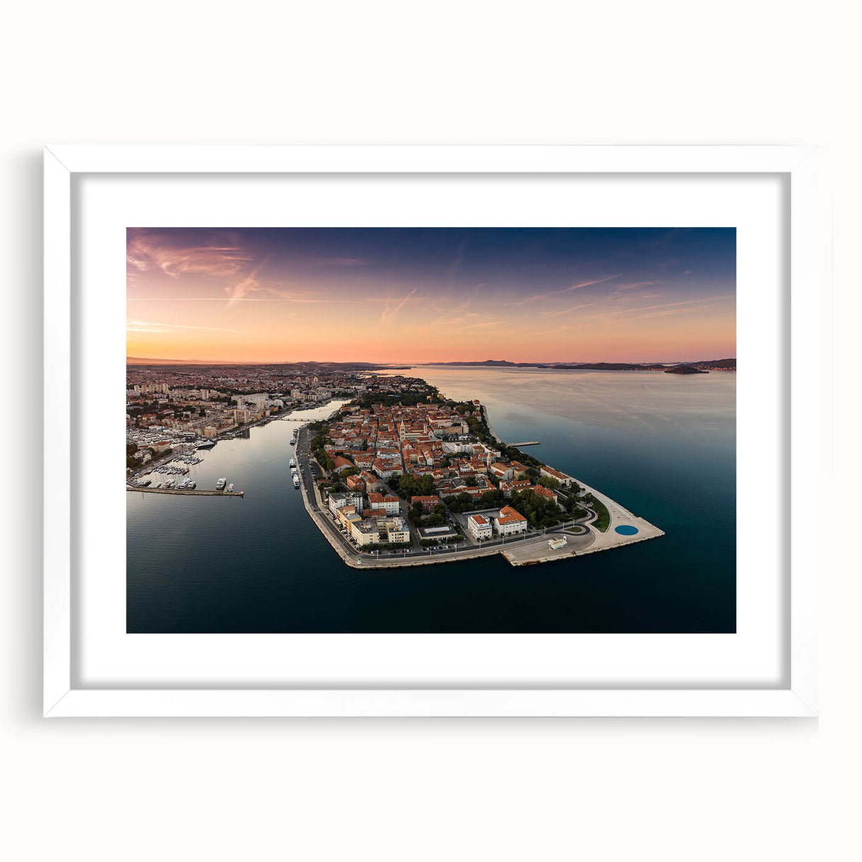 Textured abstract art print of a Croatian landscape in muted earth tones on a framed white mat, suitable for bedroom decor.