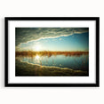 Abstract art print featuring vibrant, colorful textures of a European scenery, framed in black, ideal for living room decor.