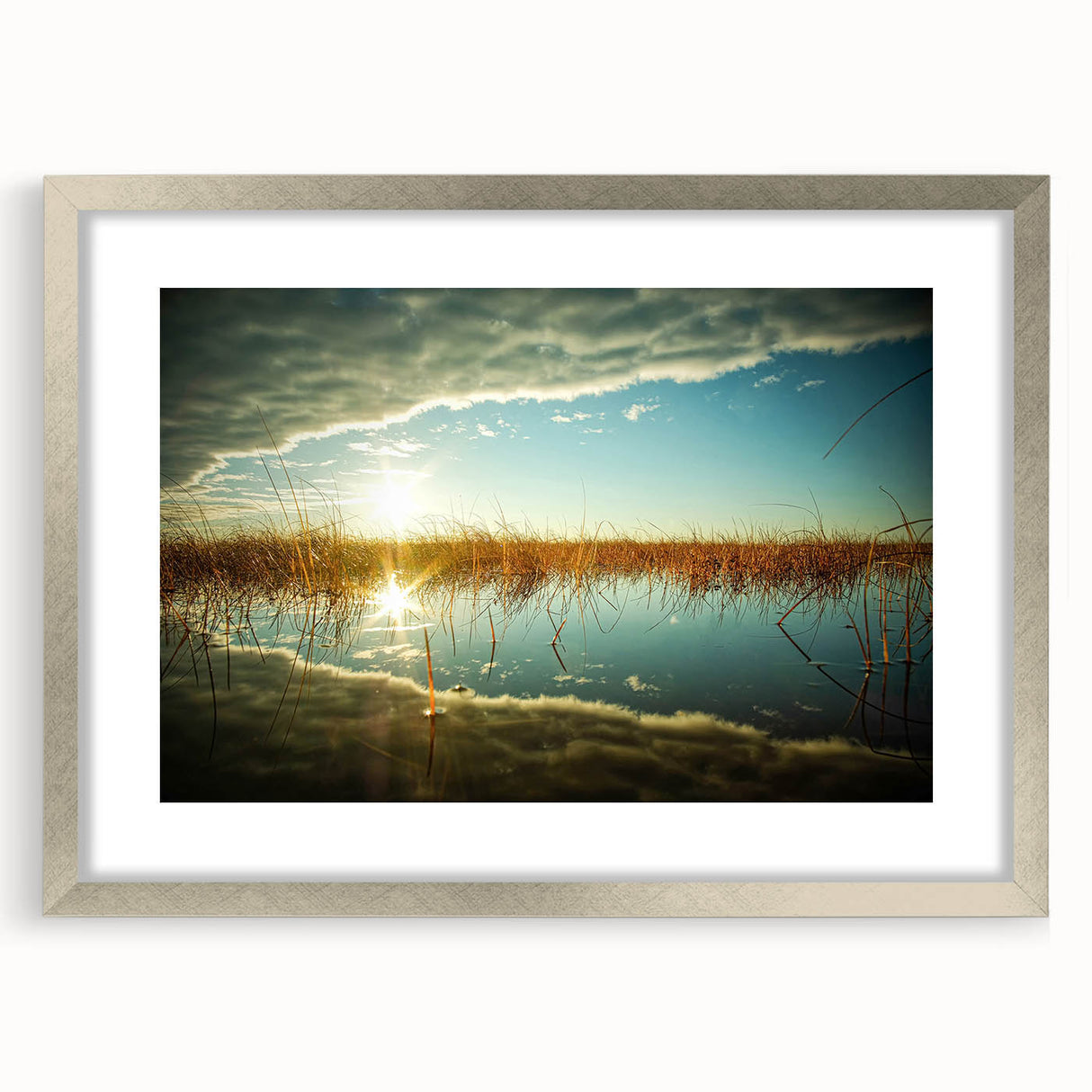 Extra large abstract art print of a European scenery in textured gray and blue tones, framed in silver.
