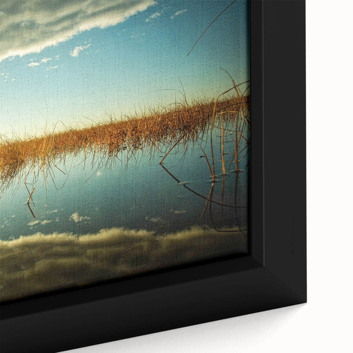 Extra large framed canvas featuring a textured depiction of a European scenery in black with vibrant, colorful art accents.