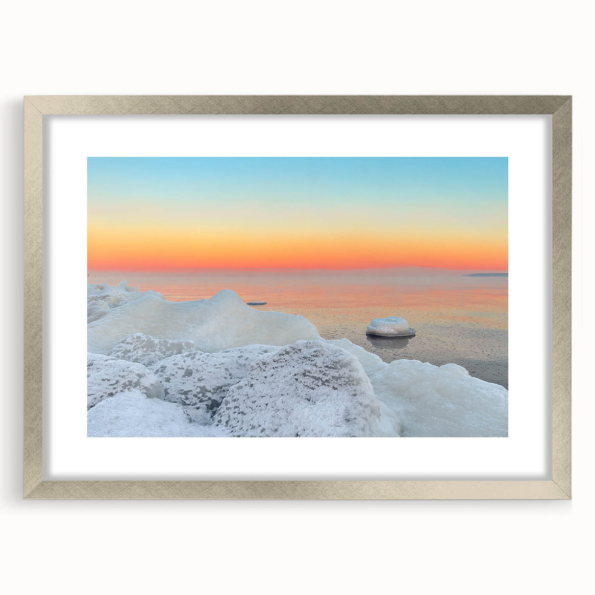 Extra large abstract art print of a textured European landscape in muted earth tones, framed in silver.
