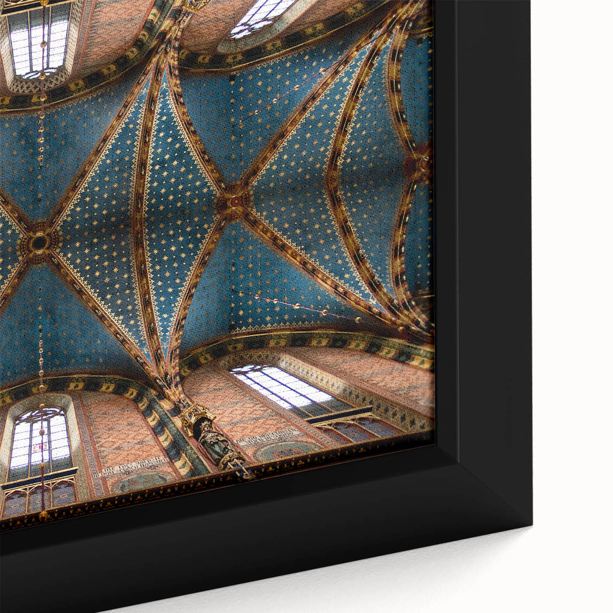 Close-up of a black wall art featuring a textured European scenery in vibrant colors on a framed canvas.