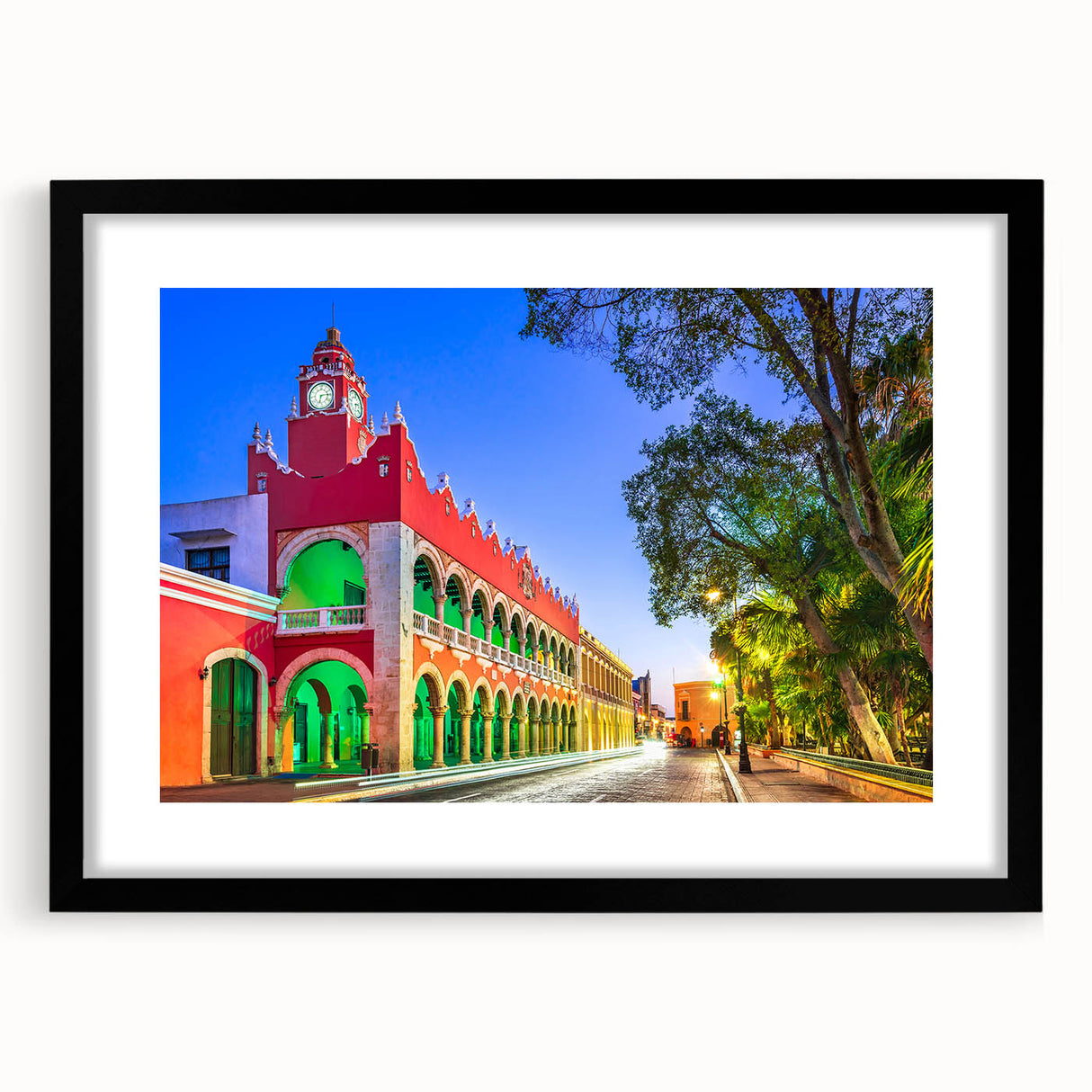 Extra large abstract art print depicting colorful, textured scenery of Yucatan, in a black frame with mat.