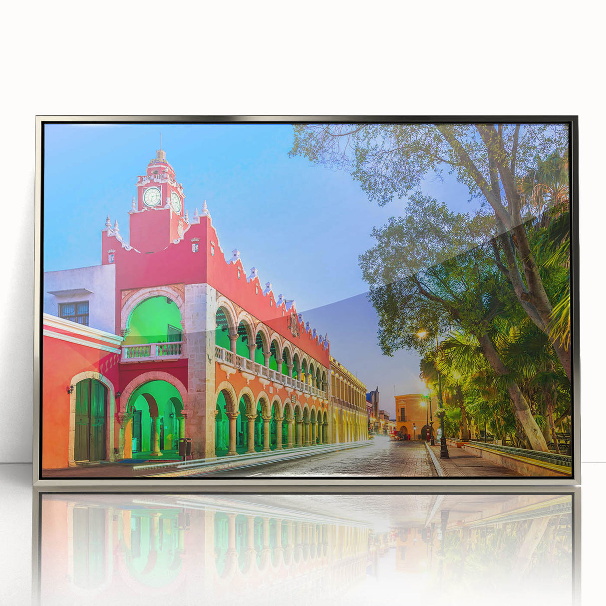 Mid-century modernist art depicting Yucatan scenery in silver-framed acrylic, featuring muted earth tones.