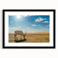 Extra large colorful abstract art print of Middle Eastern scenery in black frame, ideal for living room decor.