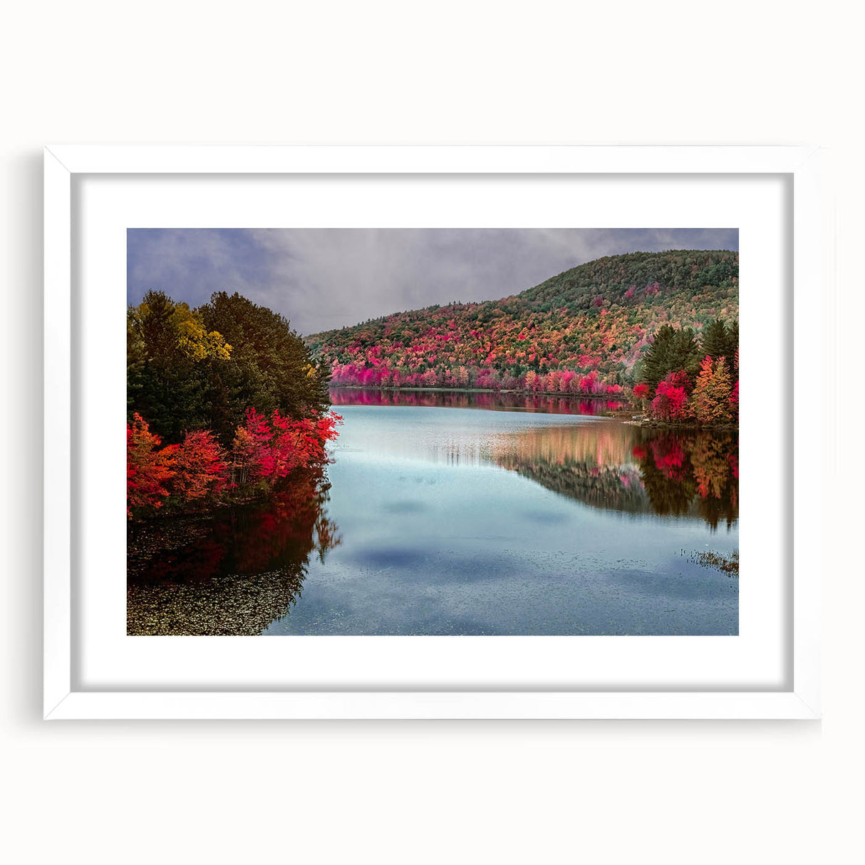 Abstract art print of Connecticut scenery in muted green and blue shades, framed with a white mat.