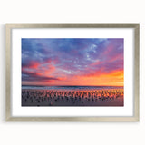 Textured art of abstract Daytona scenery in muted blue and gray, framed in silver, ideal for bedroom decor.