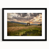 Abstract art print of Yellowstone with vibrant, textured colors on a large framed canvas, suitable for living room decor.