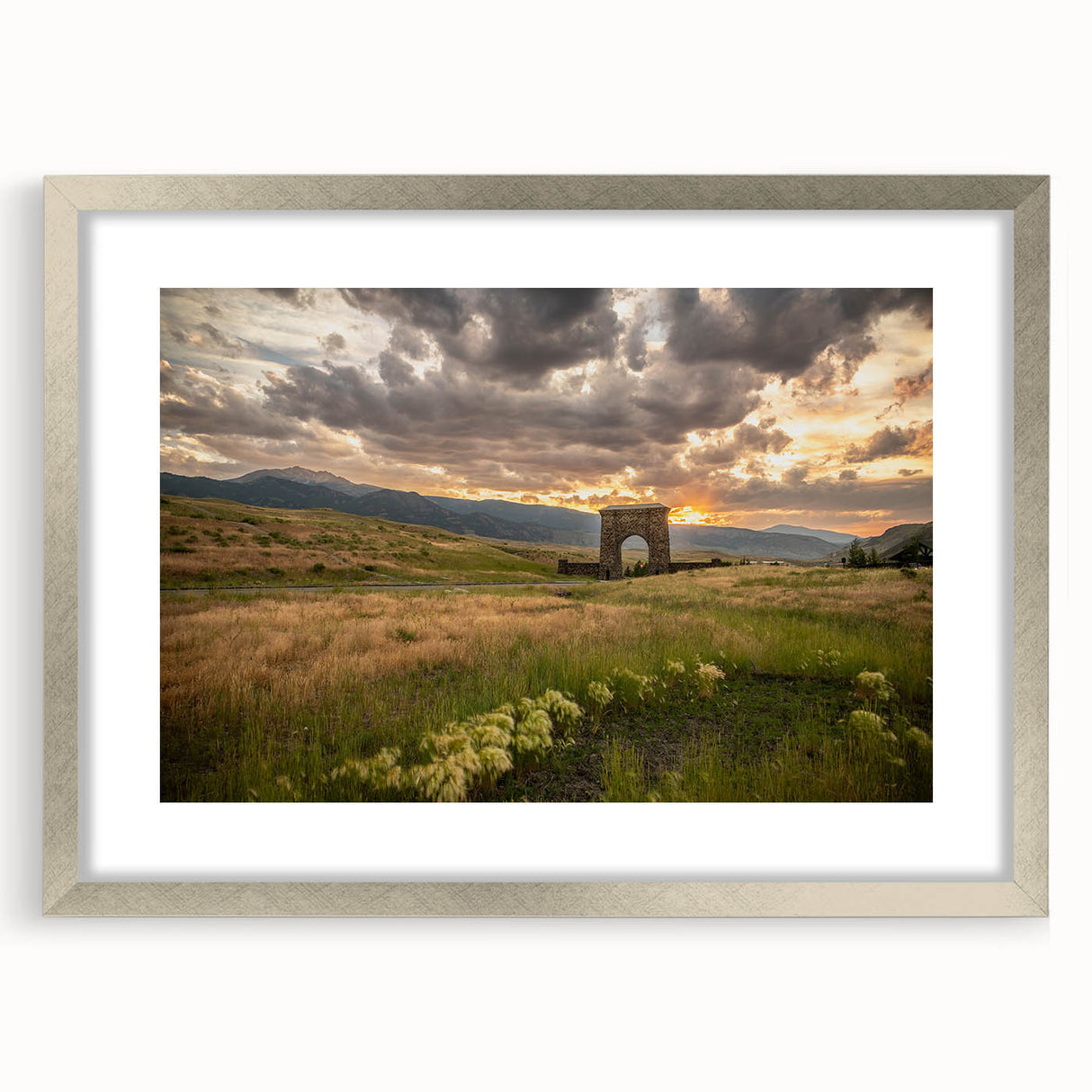 Textured abstract art print of Yellowstone scenery in muted earth tones, framed with a silver mat.