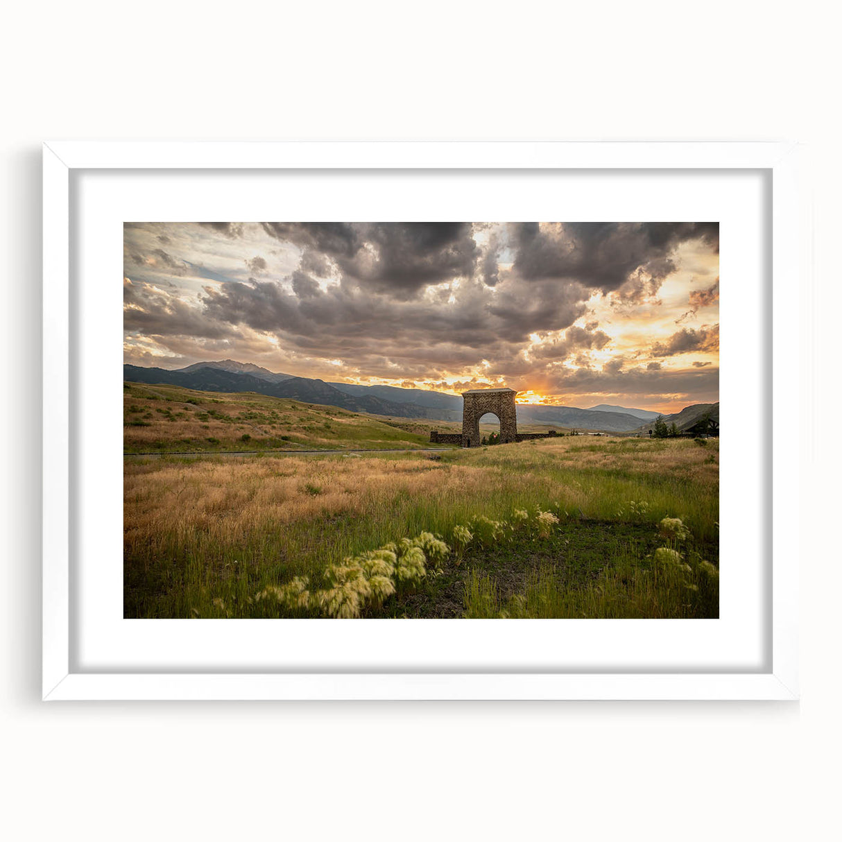 Abstract art print of Yellowstone scenery in muted earth tones, framed with a white mat.
