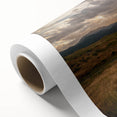 Art deco poster of Yellowstone scenery in muted green and blue tones on rolled canvas, ideal for nursery wall art.