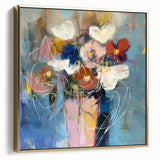 Framed canvas artwork showcasing an abstract floral design in silver and gold tones, elegantly displayed against a neutral background, enhancing modern home decor.
