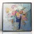 Framed acrylic artwork featuring abstract floral designs in vibrant colors, showcasing a modern aesthetic with a sleek black frame, perfect for home decor.