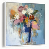Framed canvas artwork showcasing an abstract floral design in vibrant colors, set against a white background, ideal for modern home decor.