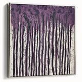Framed canvas artwork showcasing an abstract floral design in vibrant colors, elegantly displayed with a silver frame, ideal for modern home decor.