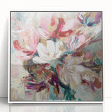 Framed abstract floral artwork in a sleek white frame, showcasing vibrant colors and dynamic shapes, perfect for modern home decor and enhancing any living space.