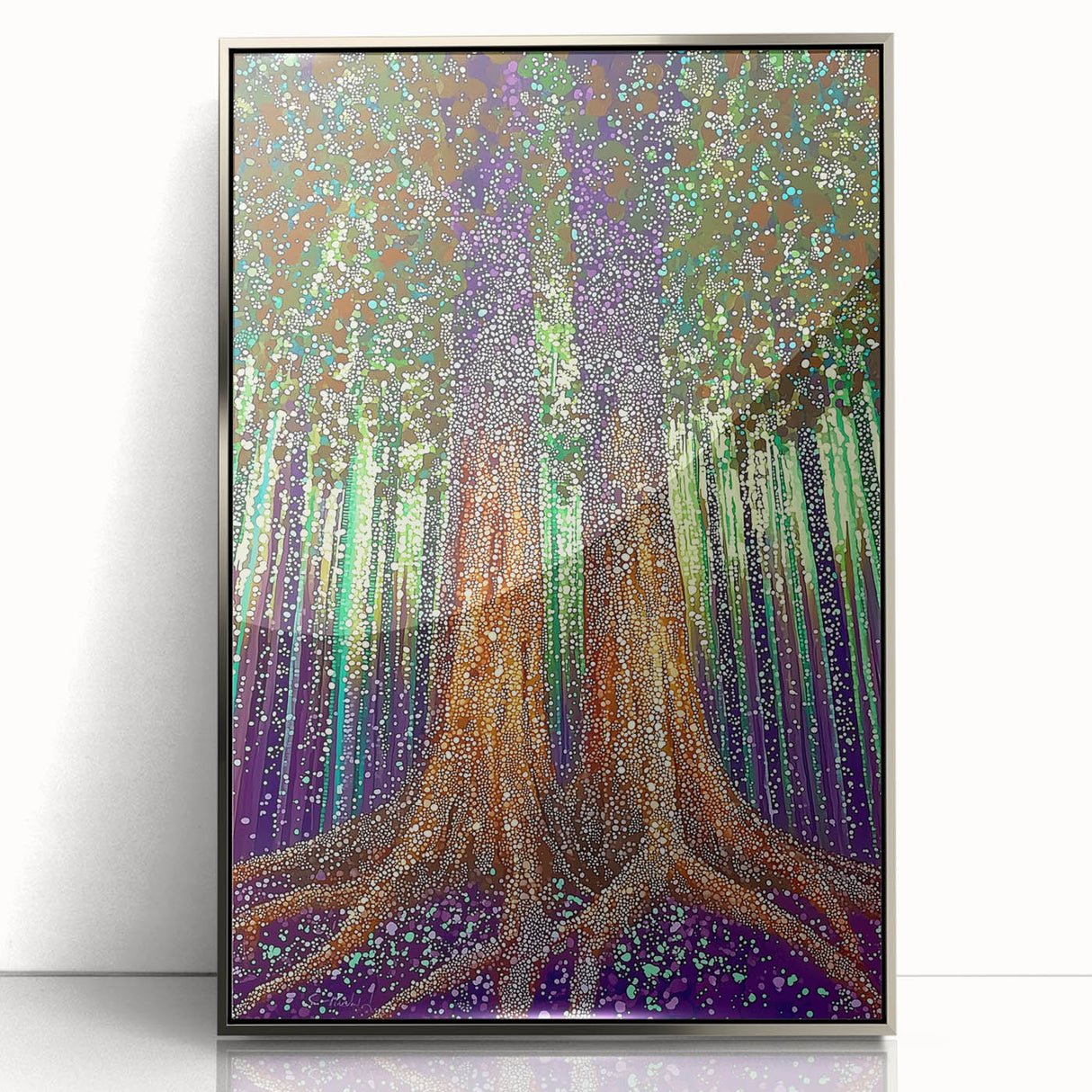 Framed acrylic art piece showcasing abstract floral design in vibrant colors, featuring silver accents and a sleek modern frame, perfect for contemporary decor.