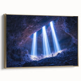 Framed canvas artwork showcasing a stunning landscape with caves, featuring rich gold accents. Perfect for adding a touch of elegance to modern decor.