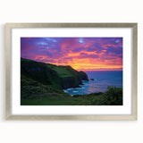 Framed landscape artwork of dramatic cliffs in silver matting, showcasing a blend of earthy tones and textures, perfect for modern home decor.