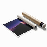 Desert landscape rolled print showcasing vibrant hues of orange and yellow with abstract mountain silhouettes, elegantly packaged in a protective tube for delivery.