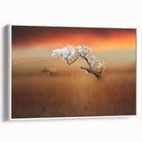 Framed canvas artwork depicting serene landscapes with lush green fields and a blue sky, showcasing a white frame that enhances the vibrant colors. Ideal for home decor.