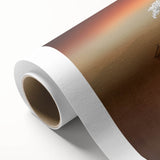 Vibrant rolled canvas print showcasing a serene landscape with lush green fields under a bright blue sky, elegantly packaged in a protective cardboard tube for delivery.