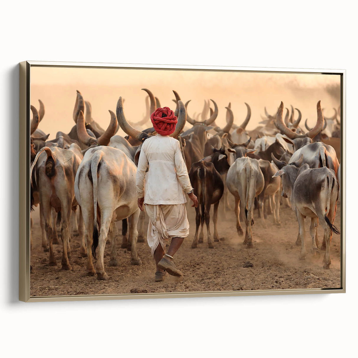 Framed canvas featuring a vintage-style landscape painting of an Indian scenery in muted gold and black tones.