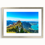 Extra large abstract art print featuring a textured depiction of a European scenery in muted earth tones, framed in silver.