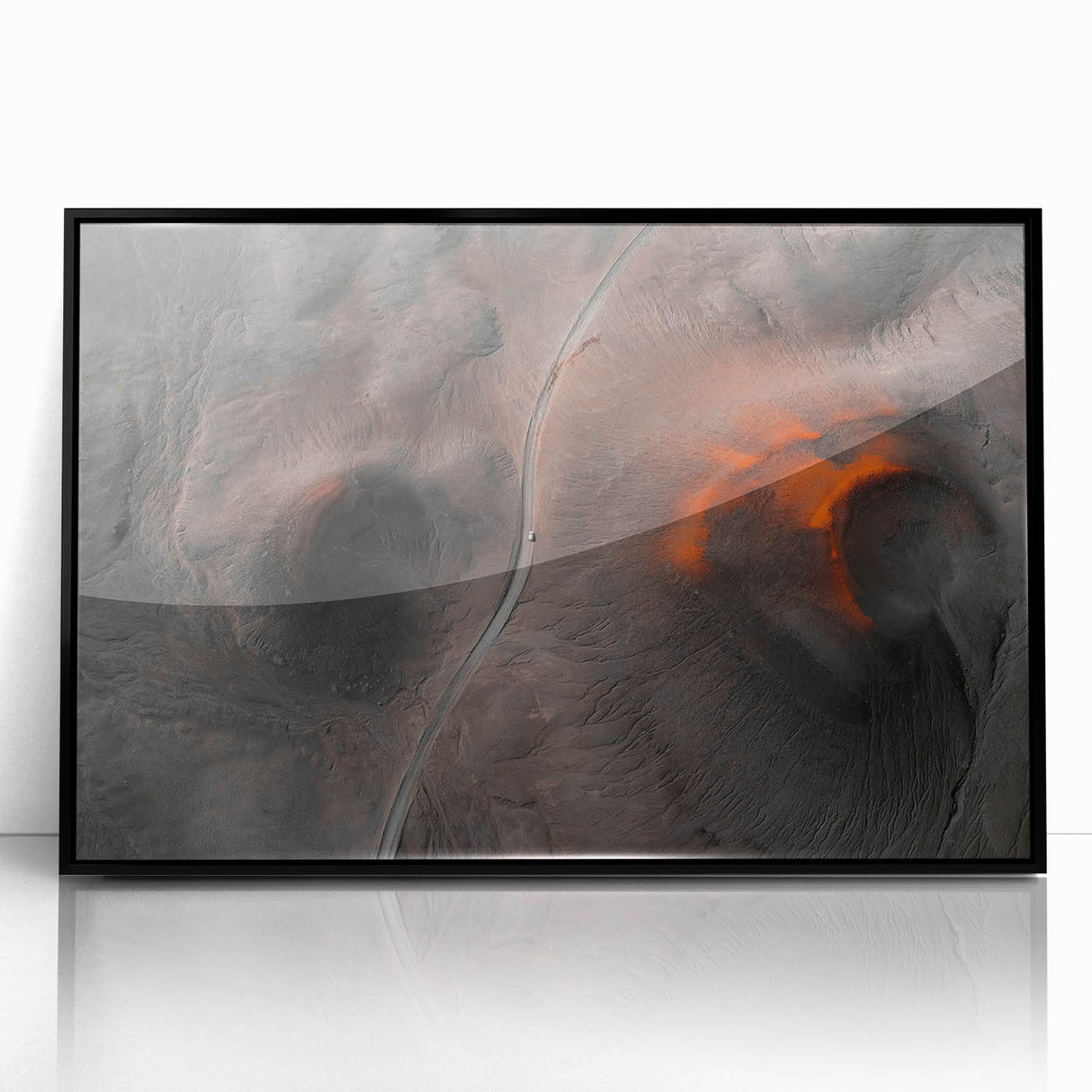 Large abstract wall art depicting a serene Icelandic landscape in muted gray and blue tones, framed in black acrylic.