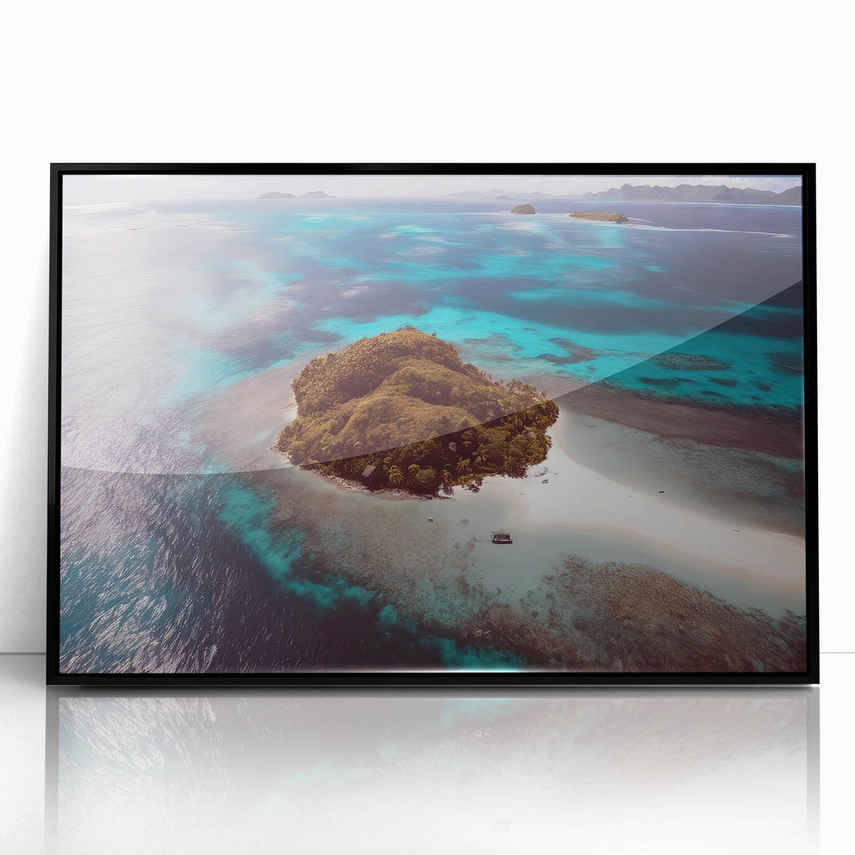 Large abstract wall art depicting an oceanic Fiji scene in muted blue and green tones, framed in black acrylic.