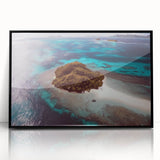 Large abstract wall art depicting an oceanic Fiji scene in muted blue and green tones, framed in black acrylic.
