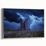 Framed canvas artwork depicting a serene landscape with a majestic castle, set against a vibrant blue sky, featuring a stylish silver frame that enhances its elegance. Ideal for home decor and art enthusiasts, this piece adds a touch of sophistication to any room.