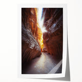 Rolled print showcasing a stunning landscape with intricate cave formations, featuring rich colors and textures, packaged securely in a protective tube for safe delivery.