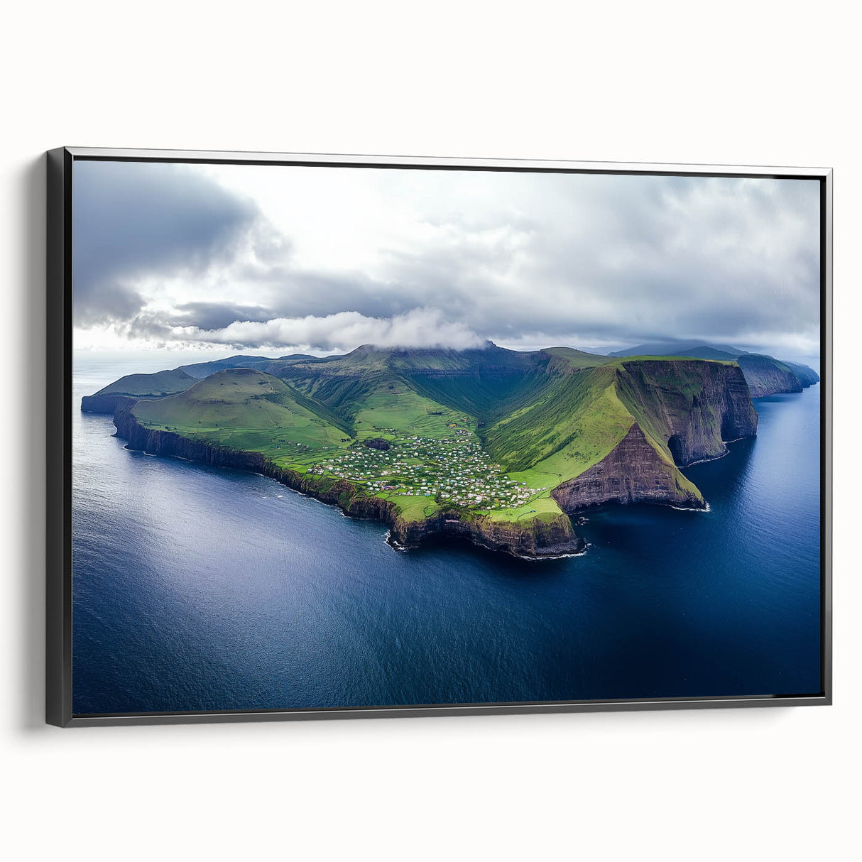 Framed canvas artwork showcasing a breathtaking landscape of rugged cliffs against a vibrant sunset, with a sleek black frame enhancing its modern appeal. Ideal for home decor enthusiasts seeking dramatic nature-inspired art.