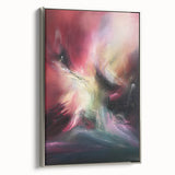 Framed canvas artwork showcasing an abstract design with colorful splatters, elegantly bordered with a sleek silver frame, ideal for modern decor.