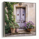Framed canvas featuring a vintage poster of a French door in black with colorful landscape art paintings.