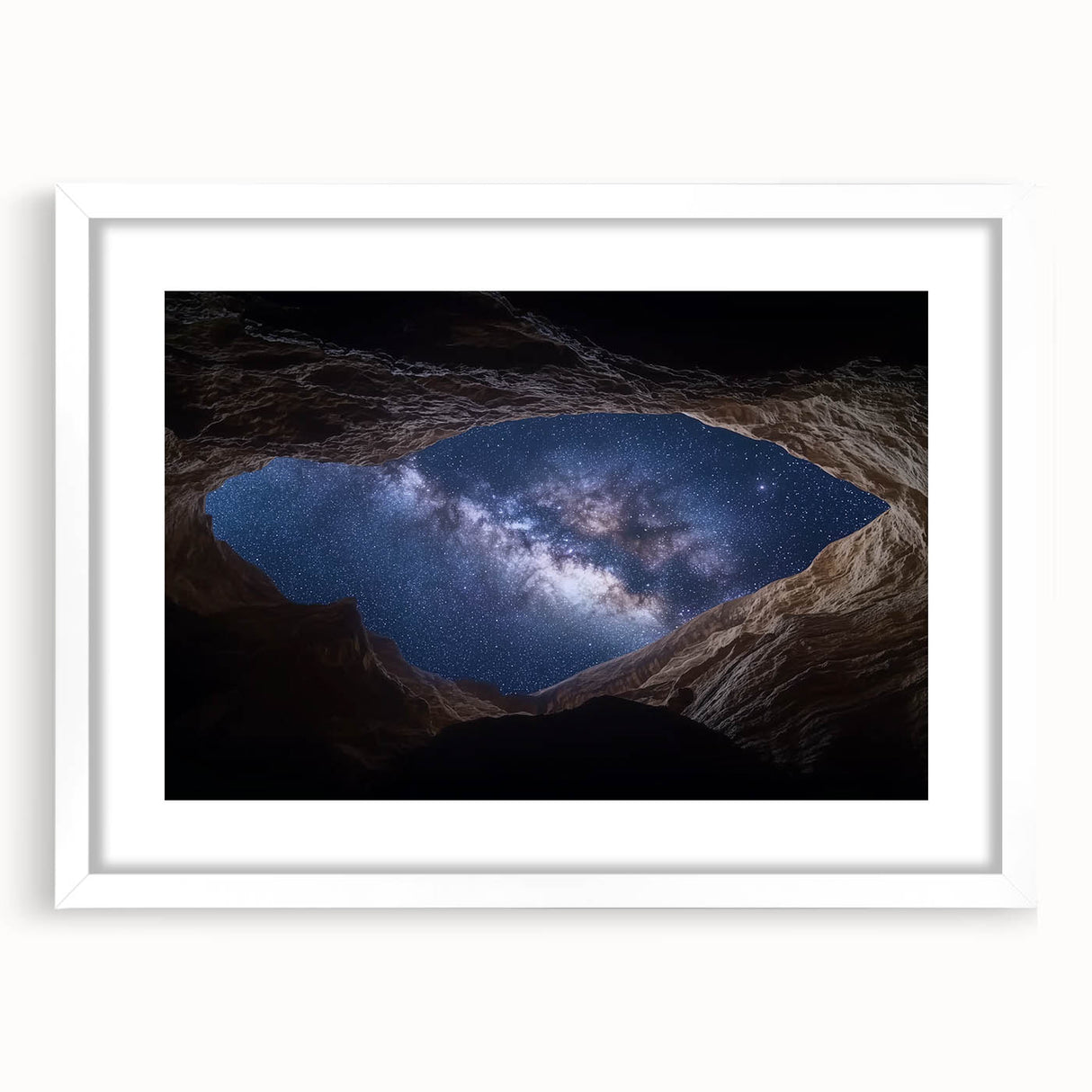 Landscape print of canyons framed with a white mat, showcasing vibrant earth tones and dramatic rock formations, perfect for enhancing modern home decor.
