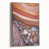 Framed canvas artwork showcasing a serene desert landscape with rich, warm tones and a sleek silver frame, ideal for enhancing modern home decor.
