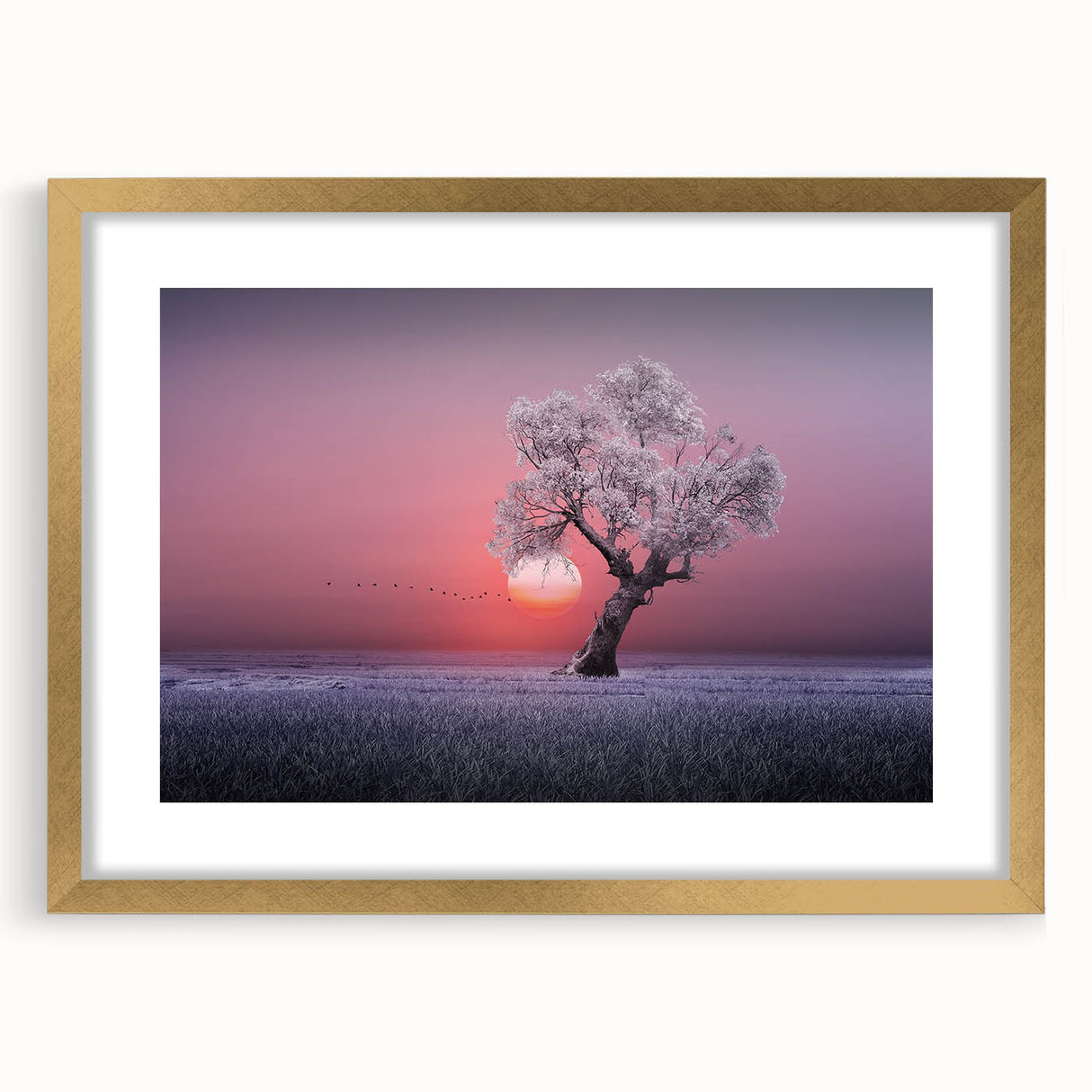 Elegant gold-framed landscape artwork showcasing serene fields under a clear blue sky, complemented by a white mat for added sophistication. Ideal for home decor.