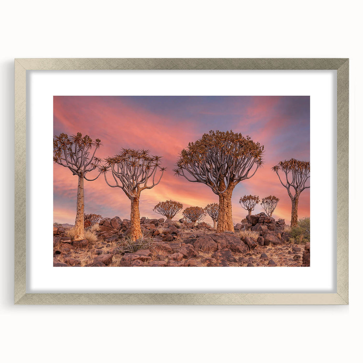 Abstract art print depicting a serene Namibian landscape, rendered in muted earth tones on a silver-framed mat.