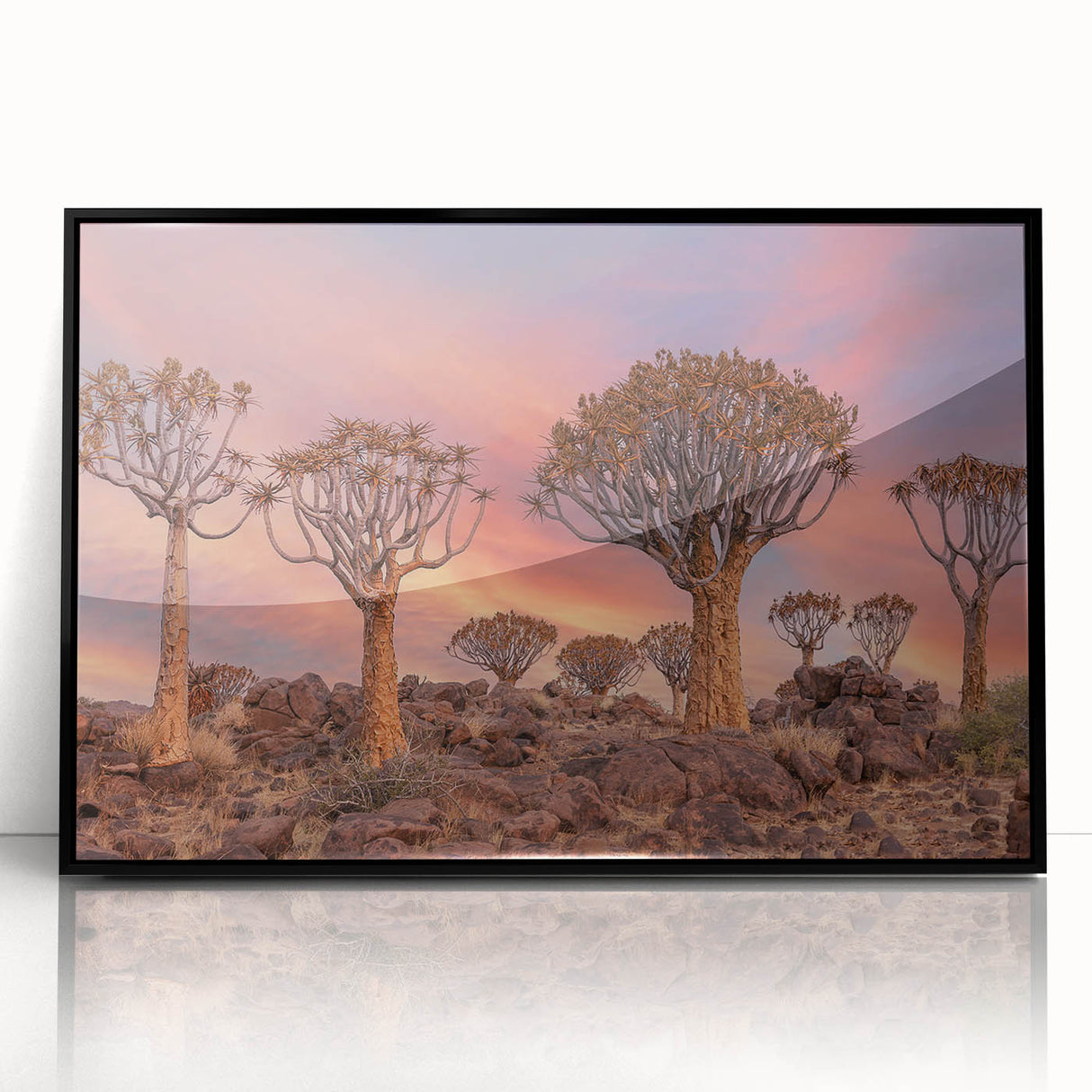 Large abstract wall art depicting an African savannah in muted earth tones on a framed acrylic.