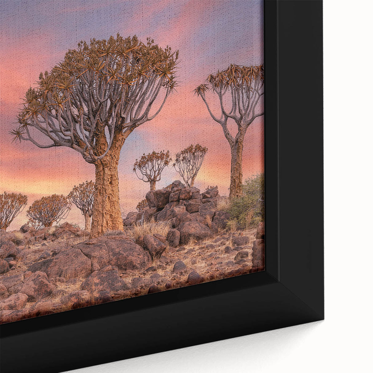 Extra large framed canvas of a textured African scenery in black with colorful accents, ideal for living room decor.