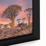 Extra large framed canvas of a textured African scenery in black with colorful accents, ideal for living room decor.