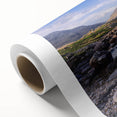 Art deco poster of Cumbria landscape in muted green and blue tones on rolled canvas, ideal for nursery wall art.