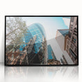 Large abstract wall art depicting the London skyline in muted gray and blue tones on a framed acrylic panel.